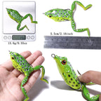 Green frog-shaped fishing lure with measurements on a white background