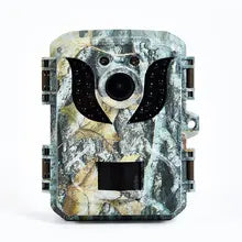 Discreetly nestled among the foliage, this small game camera with its camouflage design is the perfect covert companion for wildlife photography and surveillance.