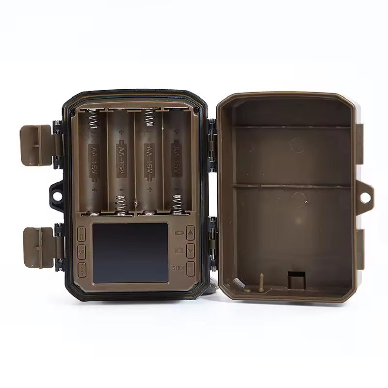 An open camera case designed for the smallest travel camera, showcasing interior compartments for batteries and a small LCD screen, emphasizing its compact design and portability for travelers.