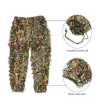 Close-up feature details of the ghillie suit pants. Highlights the Adjustable trouser belt and the Elastic ankle strap for a secure fit, essential for a functional camouflage grass suit. Shows the dense, leafy pattern of the camo ghillie suit for effective concealment.